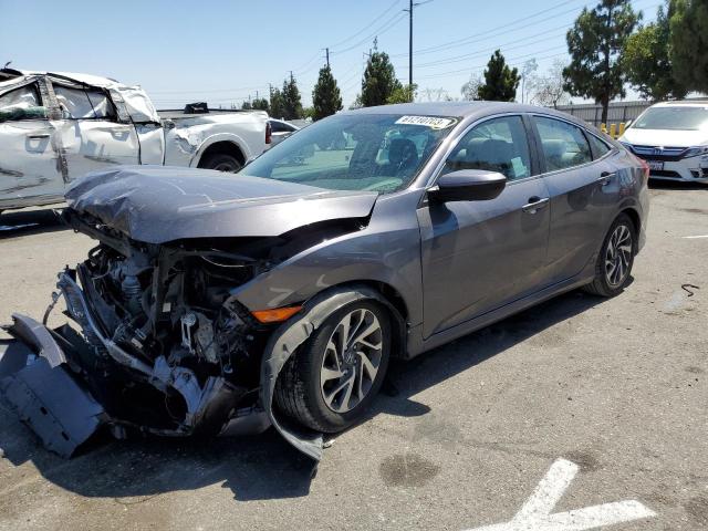 HONDA CIVIC EX 2017 with VIN 2HGFC2F77HH509898 - Photo from auction