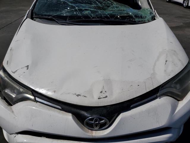 Photo 12 from auction – 2016 TOYOTA RAV4 LE with VIN JTMZFREVXGJ099249