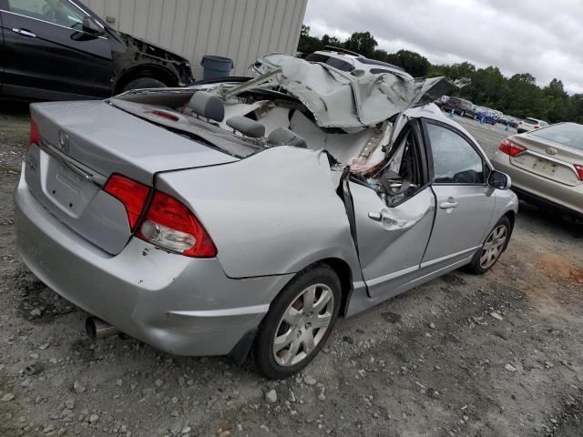 Photo 3 from auction – 2011 HONDA CIVIC LX with VIN 19XFA1F51BE025127