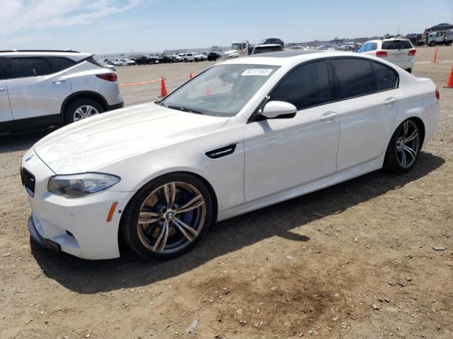 BMW M5 2013 with VIN WBSFV9C55DD095573 - Photo from auction