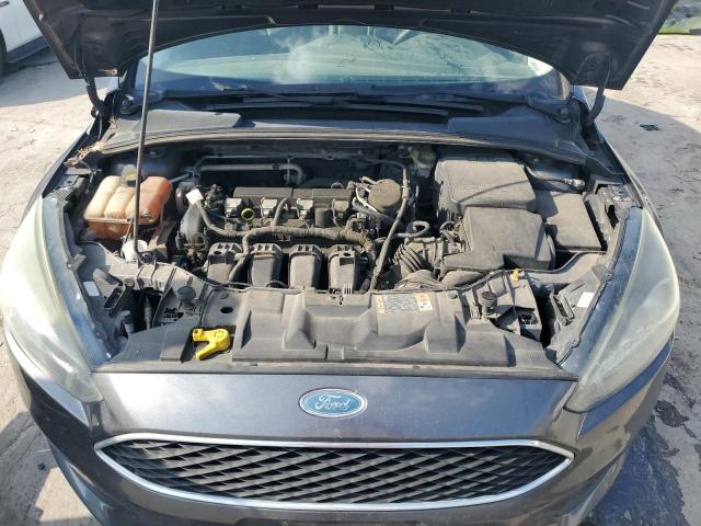 Photo 11 from auction – 2015 FORD FOCUS SE with VIN 1FADP3F26FL319472