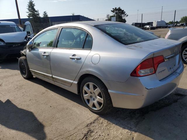 Photo 2 from auction – 2010 HONDA CIVIC LX with VIN 19XFA1F58AE018576