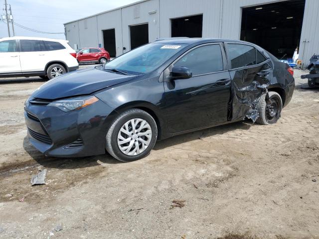 TOYOTA COROLLA L 2019 with VIN 5YFBURHEXKP863379 - Photo from auction