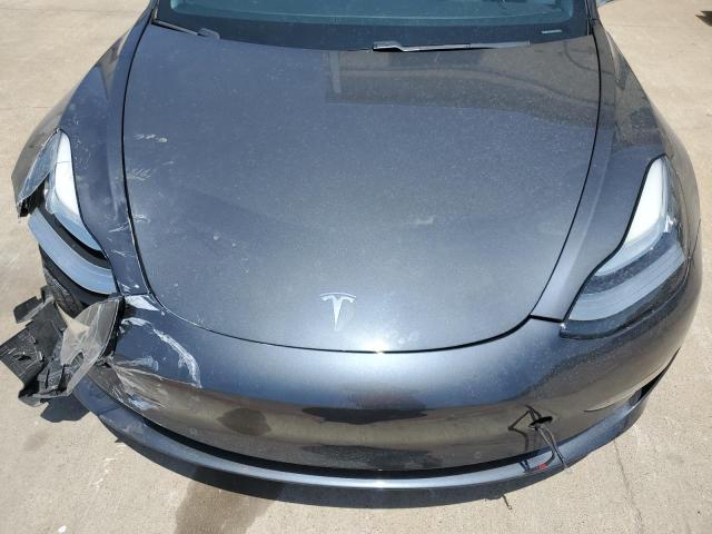 Photo 11 from auction – 2018 TESLA MODEL 3 with VIN 5YJ3E1EB2JF077003