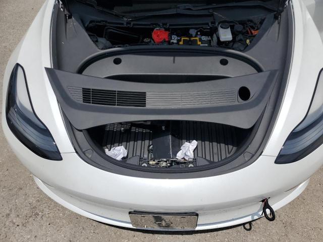 Photo 11 from auction – 2021 TESLA MODEL 3 with VIN 5YJ3E1EAXMF032371