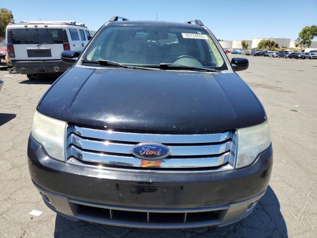 Photo 5 from auction – 2008 FORD TAURUS X S with VIN 1FMDK02W58GA09966