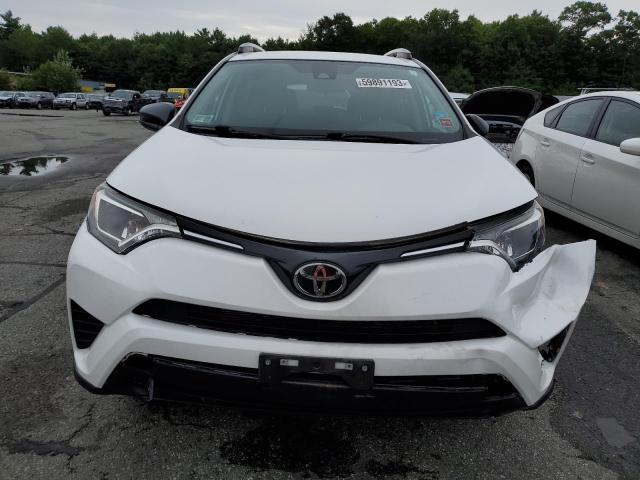 Photo 5 from auction – 2018 TOYOTA RAV4 LE with VIN 2T3BFREV3JW755706