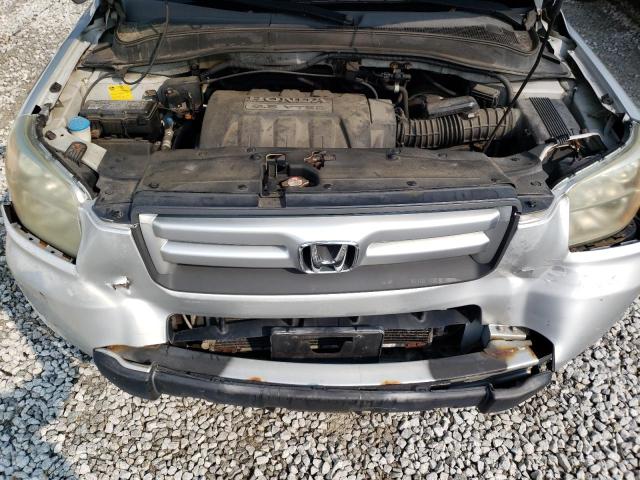 Photo 11 from auction – 2006 HONDA PILOT LX with VIN 2HKYF18156H541920