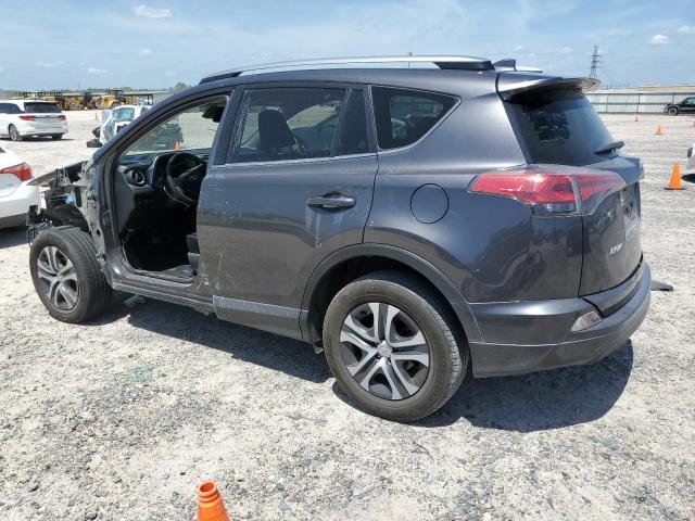 Photo 2 from auction – 2018 TOYOTA RAV4 LE with VIN JTMZFREV8JJ166180