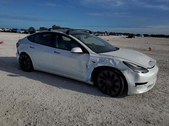 Photo 4 from auction – 2021 TESLA MODEL 3 with VIN 5YJ3E1EC6MF862721