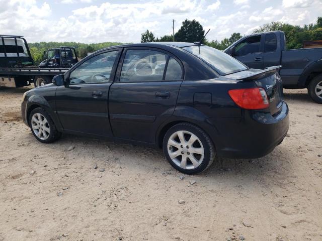 Photo 2 from auction – 2011 KIA RIO BASE with VIN KNADH4A39B6936321