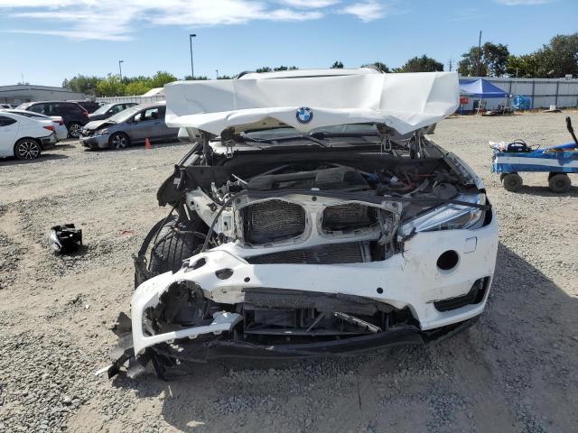 Photo 5 from auction – 2015 BMW X5 XDRIVE3 with VIN 5UXKS4C54F0N07637