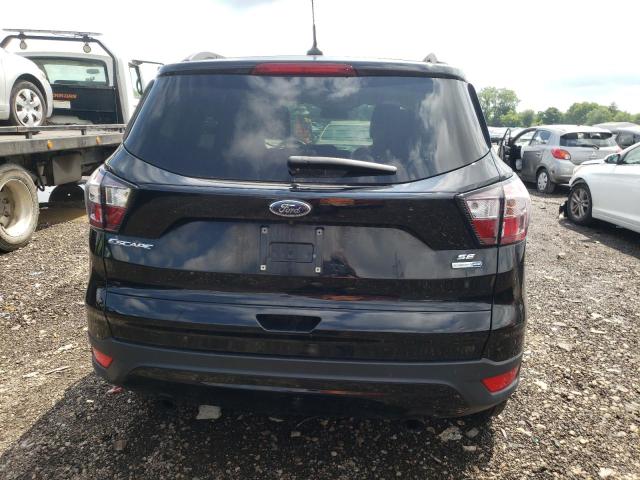 Photo 6 from auction – 2018 FORD ESCAPE SE with VIN 1FMCU9GD1JUC30764