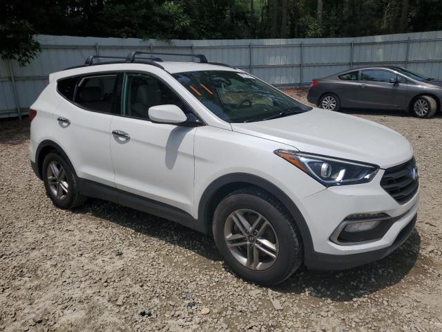 Photo 4 from auction – 2017 HYUNDAI SANTA FE S with VIN 5NMZU3LB2HH033443