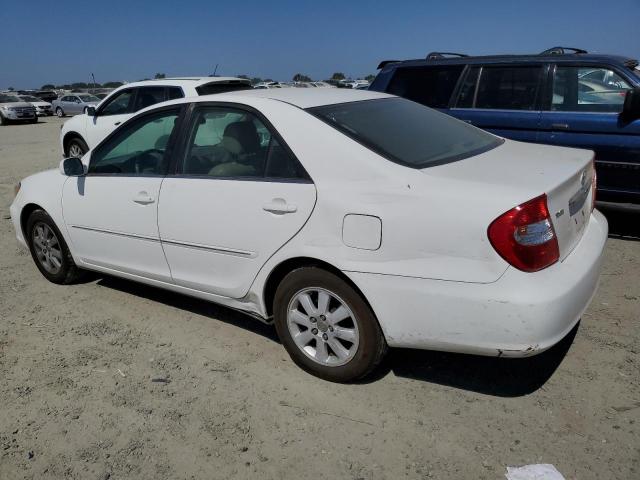 Photo 2 from auction – 2004 TOYOTA CAMRY LE with VIN 4T1BF32K44U069890