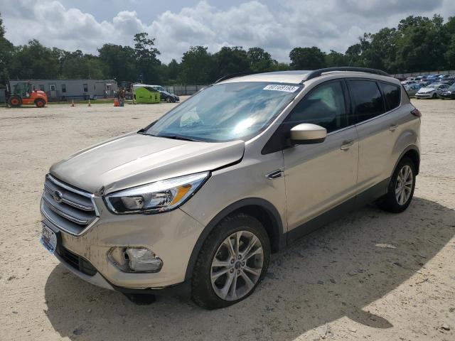 FORD ESCAPE SE 2018 with VIN 1FMCU9GD8JUB15501 - Photo from auction
