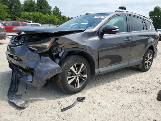 TOYOTA RAV4 XLE 2017 with VIN 2T3RFREV5HW667202 - Photo from auction