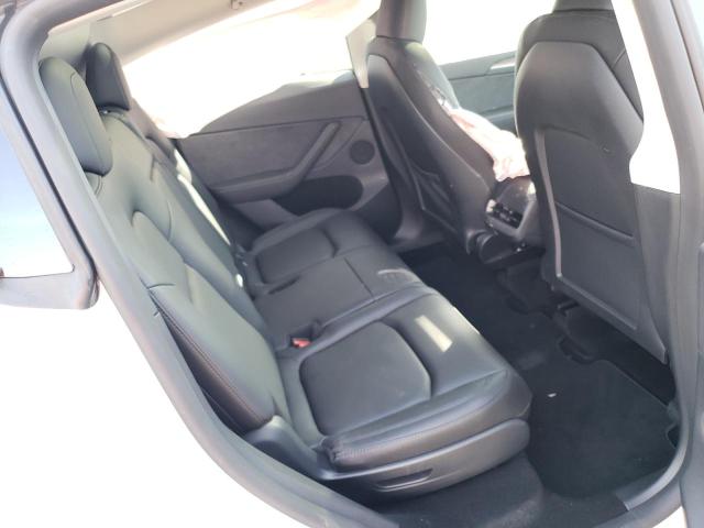 Photo 10 from auction – 2023 TESLA MODEL Y with VIN 7SAYGAEE7PF777654