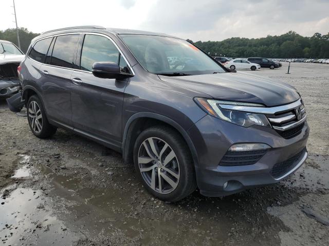 Photo 4 from auction – 2018 HONDA PILOT ELIT with VIN 5FNYF6H06JB045147