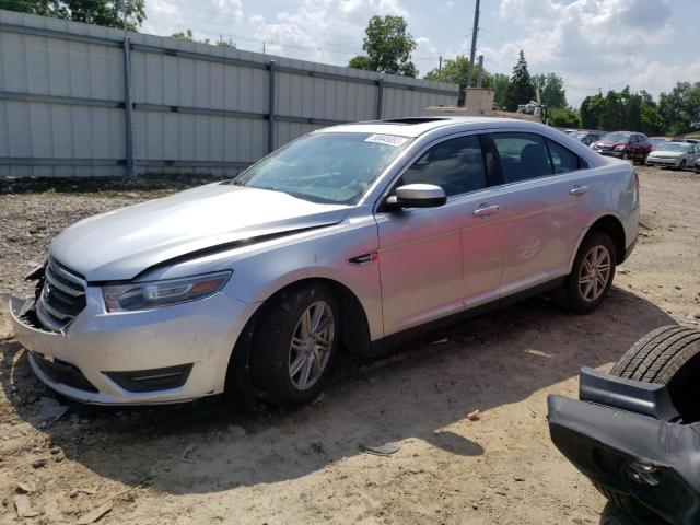 FORD TAURUS SEL 2013 with VIN 1FAHP2E8XDG174668 - Photo from auction