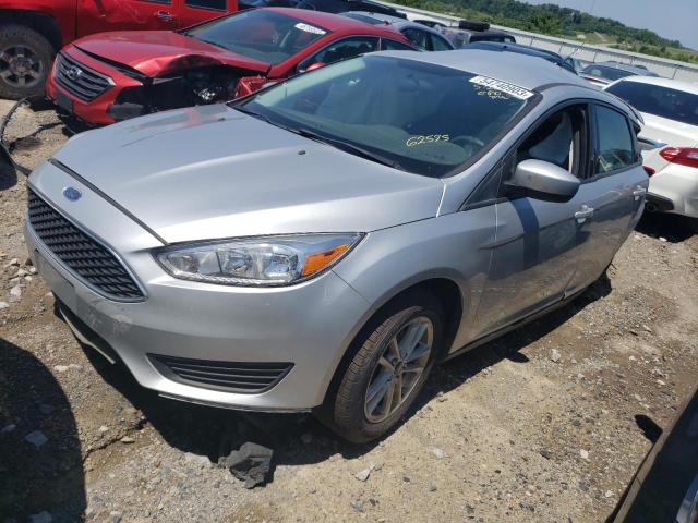 FORD FOCUS SE 2018 with VIN 1FADP3K23JL221806 - Photo from auction