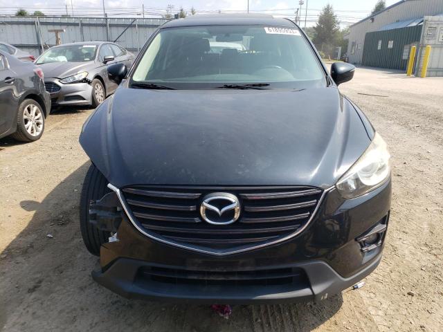 Photo 5 from auction – 2016 MAZDA CX-5 TOURI with VIN JM3KE2CY3G0643113