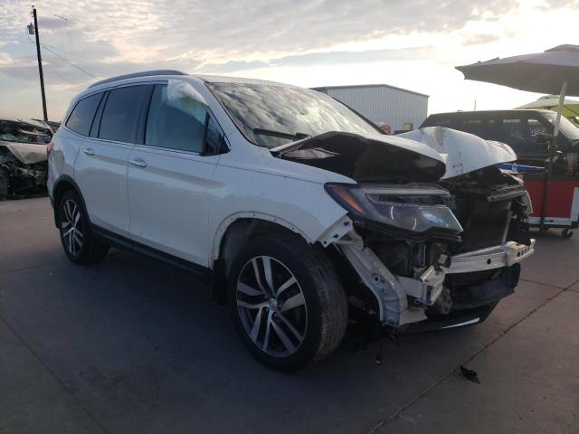 Photo 4 from auction – 2016 HONDA PILOT TOUR with VIN 5FNYF5H9XGB031592