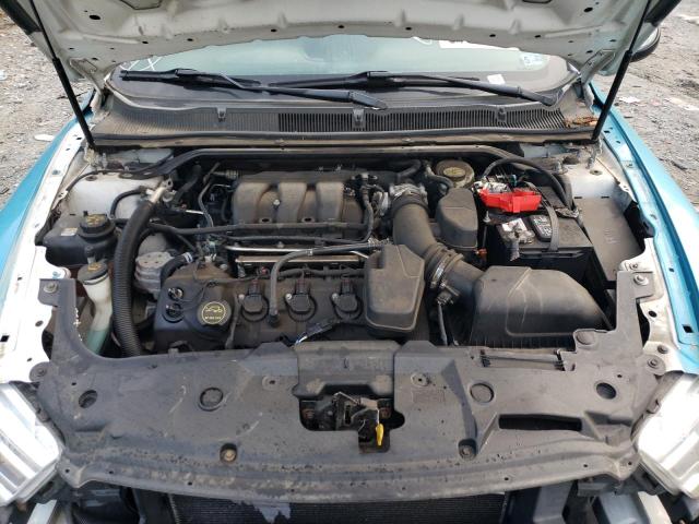 Photo 11 from auction – 2015 FORD TAURUS POL with VIN 1FAHP2MK9FG173236