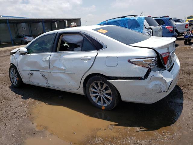 Photo 2 from auction – 2016 TOYOTA CAMRY HYBR with VIN 4T1BD1FK8GU178832