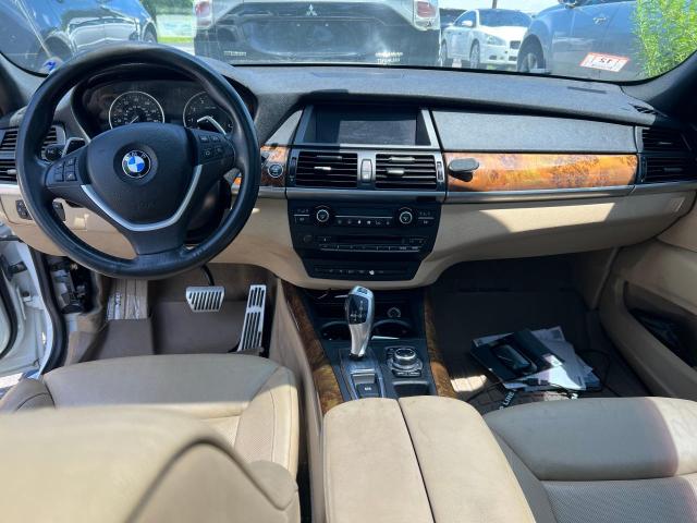Photo 9 from auction – 2012 BMW X5 XDRIVE5 with VIN 5UXZV8C54CL424488