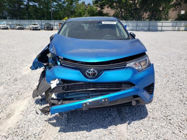 Photo 5 from auction – 2018 TOYOTA RAV4 LE with VIN JTMBFREV3JJ199430