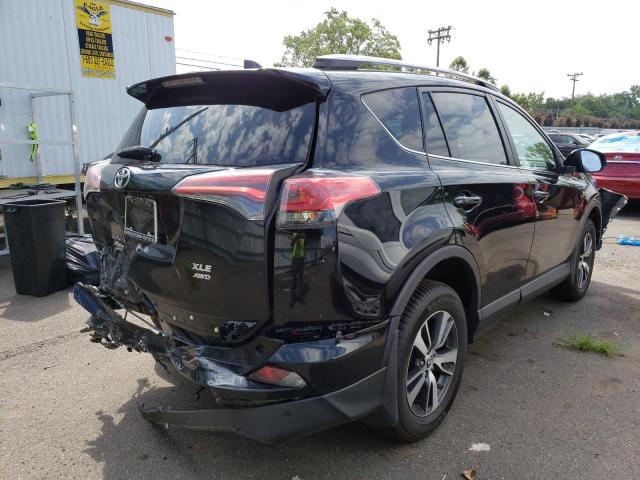 Photo 3 from auction – 2017 TOYOTA RAV4 XLE with VIN 2T3RFREV0HW651859