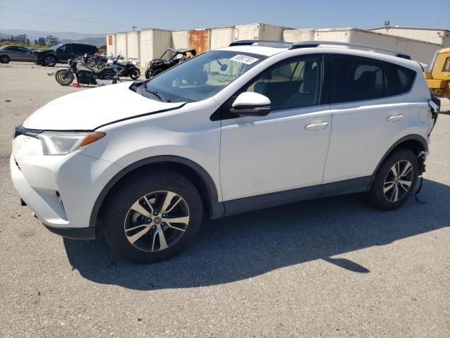 Photo 1 from auction – 2016 TOYOTA RAV4 XLE with VIN JTMWFREV8GJ085272