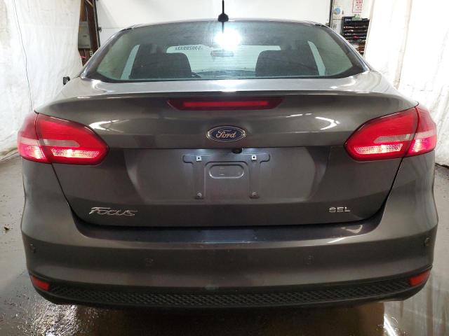 Foto 6 de la subasta – 2017 FORD FOCUS SEL con VIN 1FADP3H22HL228957