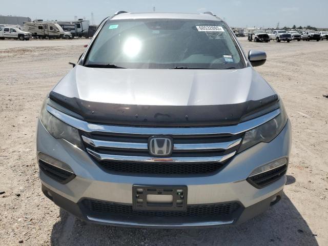 Photo 5 from auction – 2018 HONDA PILOT ELIT with VIN 5FNYF6H07JB044105