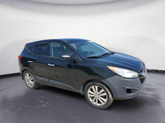 Photo 4 from auction – 2012 HYUNDAI TUCSON GLS with VIN KM8JUCAC1CU537410