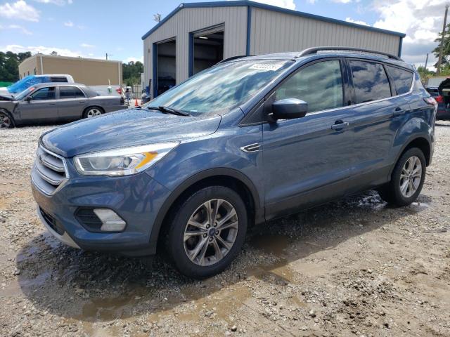 FORD ESCAPE SEL 2018 with VIN 1FMCU0HDXJUB09418 - Photo from auction