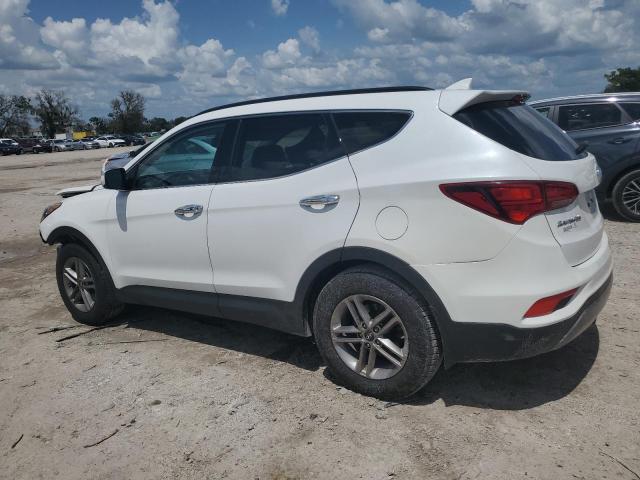 Photo 2 from auction – 2017 HYUNDAI SANTA FE S with VIN 5NMZU3LB3HH022211