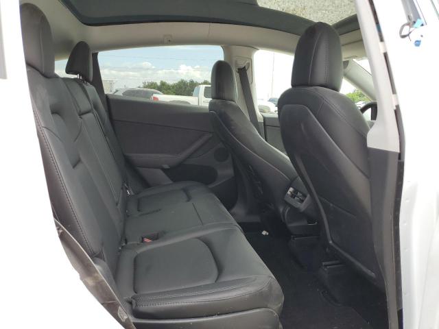 Photo 11 from auction – 2023 TESLA MODEL Y with VIN 7SAYGAEE5PF628515