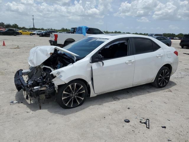 TOYOTA COROLLA L 2017 with VIN 2T1BURHE4HC877058 - Photo from auction