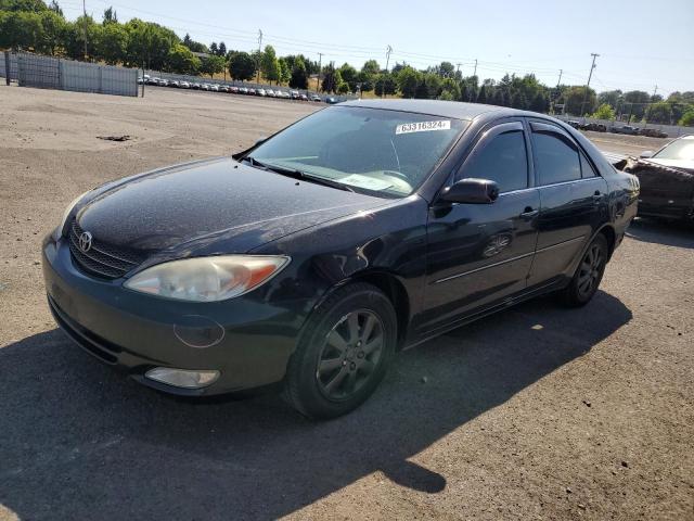 TOYOTA CAMRY LE 2004 with VIN 4T1BE30KX4U302239 - Photo from auction