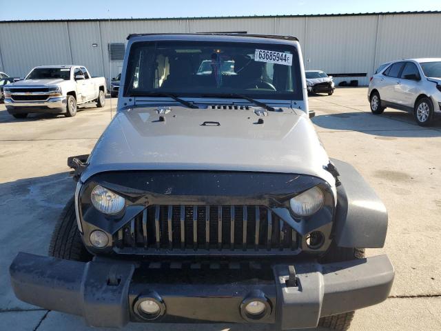 Photo 5 from auction – 2015 JEEP WRANGLER U with VIN 1C4BJWDG3FL543804
