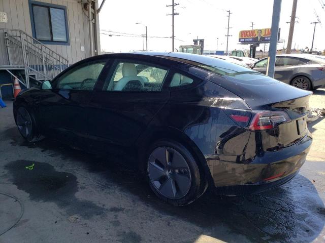 Снимка 2 от търг – 2022 TESLA MODEL 3 с VIN 5YJ3E1EA7NF373342