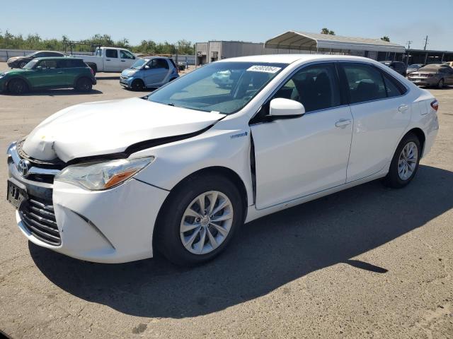 TOYOTA CAMRY HYBR 2015 with VIN 4T1BD1FK2FU166111 - Photo from auction