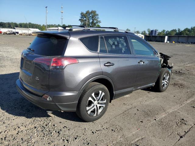 Photo 3 from auction – 2017 TOYOTA RAV4 LE with VIN JTMBFREV1HJ701474