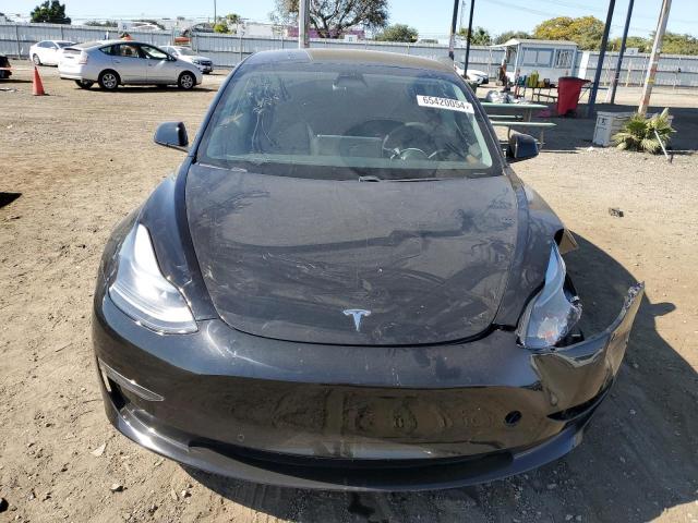 Photo 5 from auction – 2021 TESLA MODEL 3 with VIN 5YJ3E1EA3MF981809
