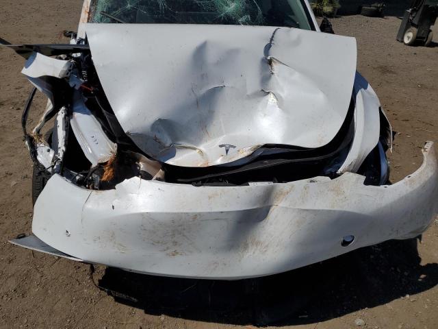 Photo 11 from auction – 2024 TESLA MODEL Y with VIN 7SAYGDEE6RF088774