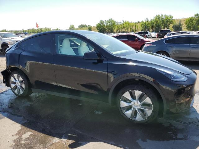 Photo 4 from auction – 2023 TESLA MODEL Y with VIN 7SAYGDED4PF909844