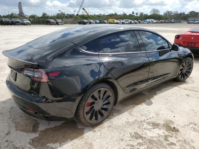 Photo 3 from auction – 2022 TESLA MODEL 3 with VIN 5YJ3E1EC2NF199312