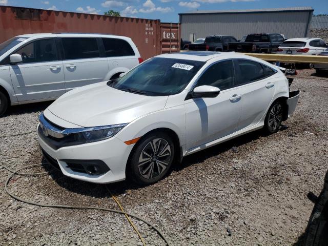 HONDA CIVIC EXL 2018 with VIN JHMFC1F78JX021200 - Photo from auction